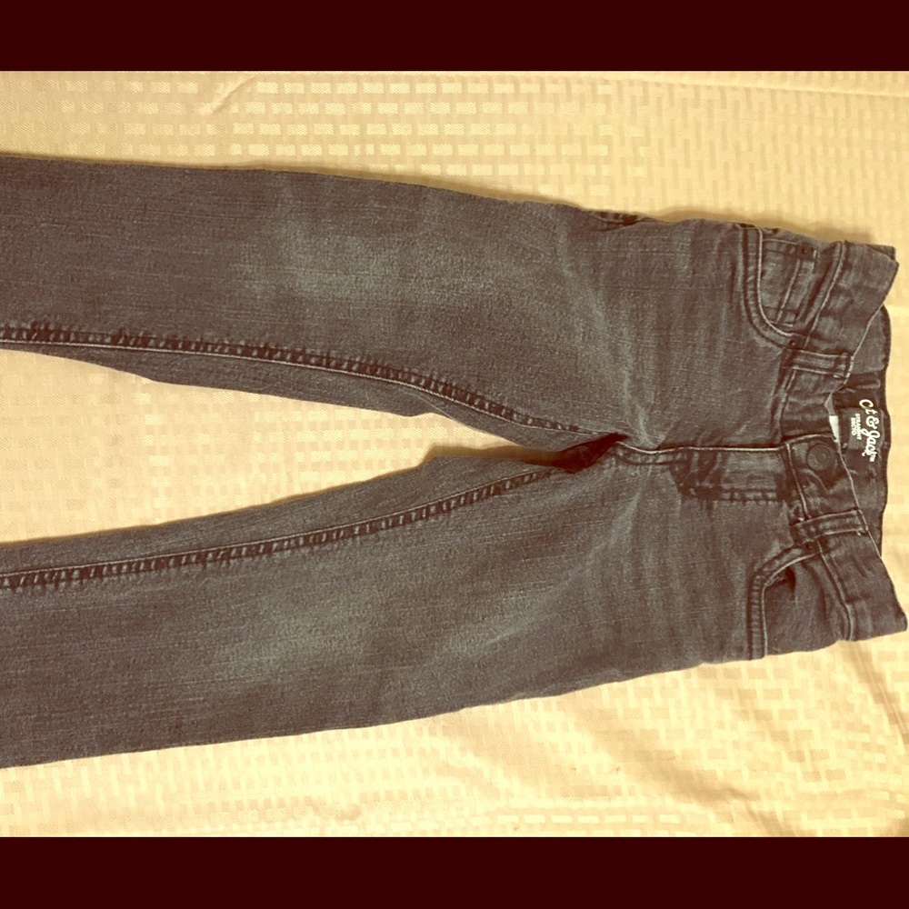 Faded black straight leg jeans.
